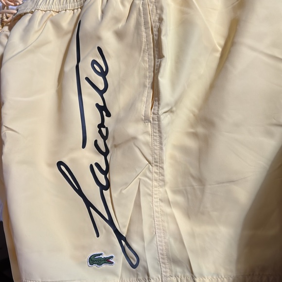 Lacoste Men's Yellow Solid Elastic Waist Swim Shorts Trunks - Picture 4 of 4